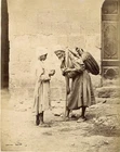 Waterseller with boy by Emile Bechard. Egypt. c 1870's. Occupational.