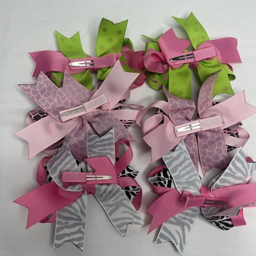 JoJo Siwa mixed with other bows and matching smaller bows. - Picture 6 of 11
