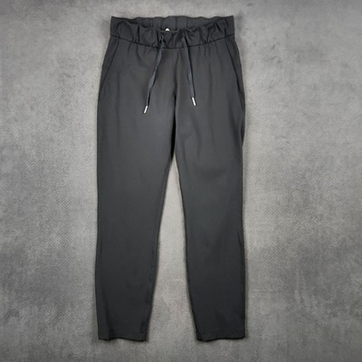 lululemon On the Fly 7/8 Pant Womens 4 Black Luxtreme Drawstring Casual LW5ASMS