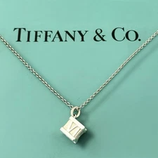 AUTHENTIC Tiffany & Co. Atlas Padlock Necklace – Rare Vintage Roman Numeral Cube