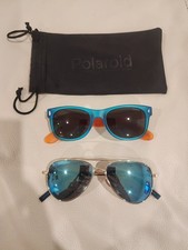 Stylish Polaroid sunglasses For Kids set. Includes vibrant blue wayfarer