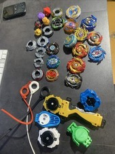 Beyblade Bulk Lot With Launchers, And Miscellaneous Parts.