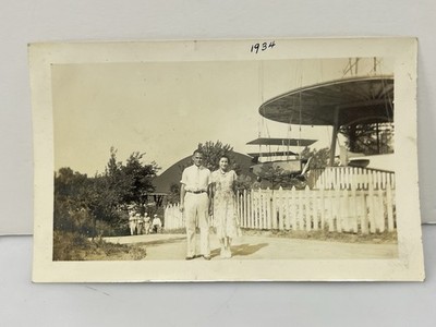 Found Photo Man & Woman at Amusement Park Plane Swing Ride 1934 Fair Carnival