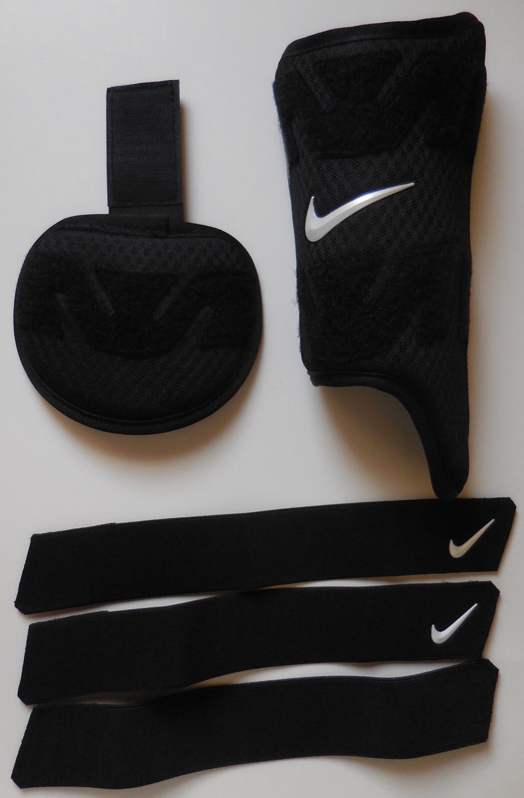 Nike Alpha Elite Batters Leg Guard LHH Youth Unisex Black/Black/White