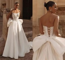 Strapless Corset A‑Line Wedding Dress Lace Beaded Bodice Big Satin Bow Back Gown