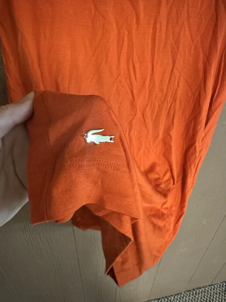 Vestido Camiseta Lascoste Naranja Cerrado Abertura Cuello Redondo Fluido Golf Exterior Talla 34 (2) Foto 2 de 4