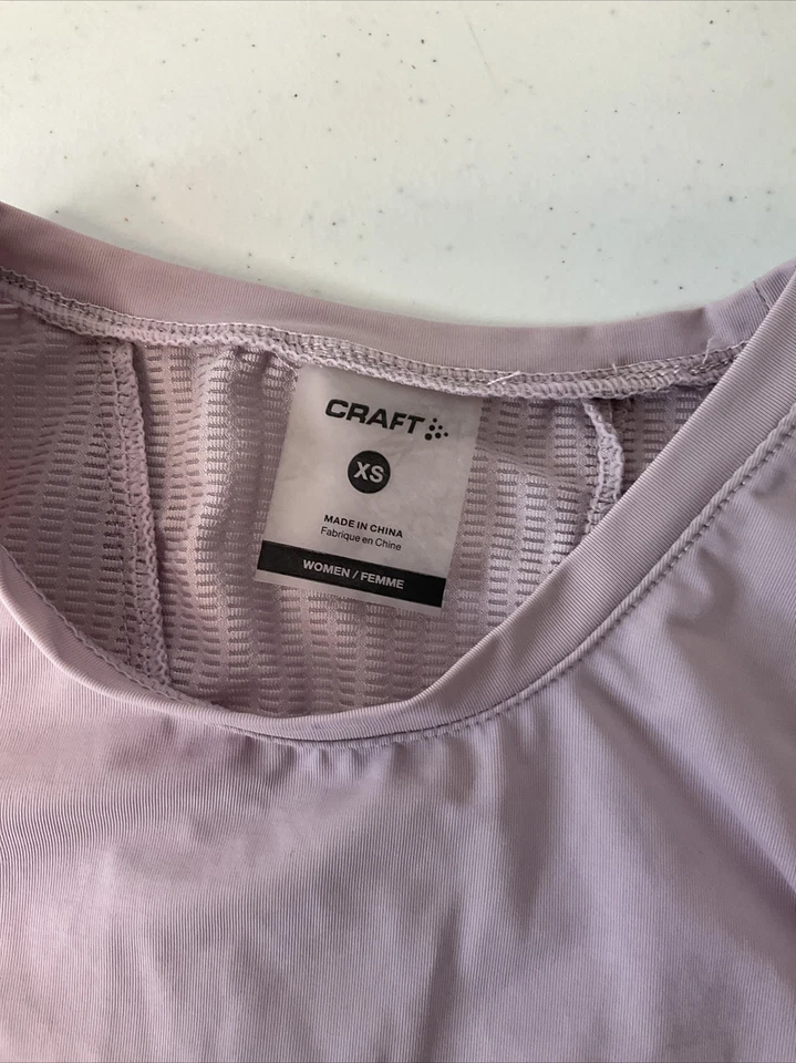 Camiseta sin mangas Craft Spartan camisa sin mangas para correr atlética espalda abierta para mujer XS Foto 2 de 4