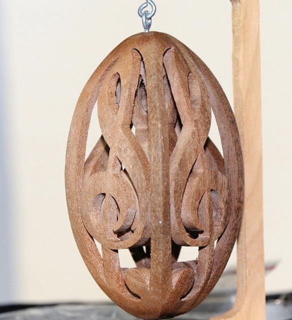 Hand carved musical scroll saw carving.From one piece of wood "G" clef