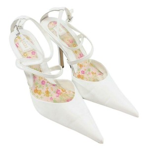 white strappy pointed toe heels