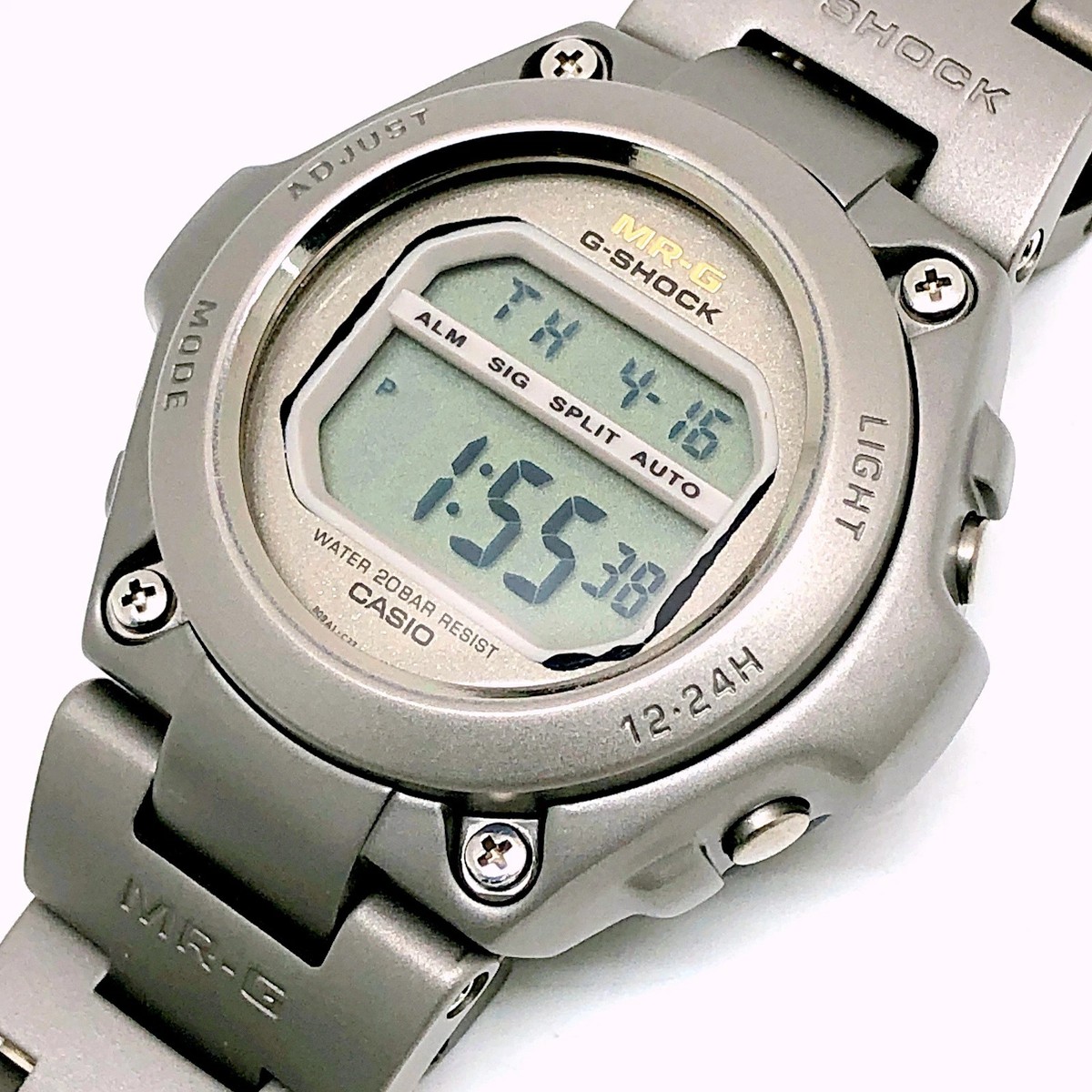 G-SHOCK MRG-100T-8 Titanium Digital Watch Gold Dial Silver Band 