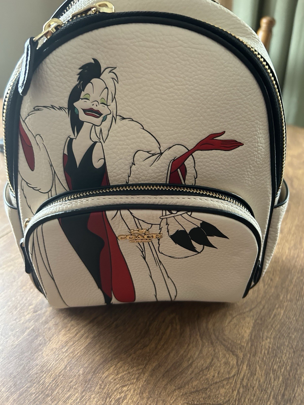 Nwt Disney x Coach mini court backpack with Cruella NWT COACH x DISNEY Cruella Motif Mini Pebbled Leather Court  main image 3