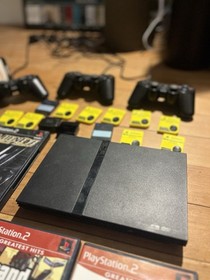 Sony PlayStation 2 Slim Collection Lot 24 Games 3 Controllers Eye Toy OEM Cables