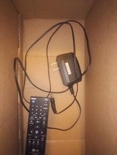 LG blu-ray and dvd player w/ remote and power cord, model bp145, works fine