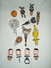 Wine bottle stoppers / corks....variety of metal / glass / misc...thirteen (13)
