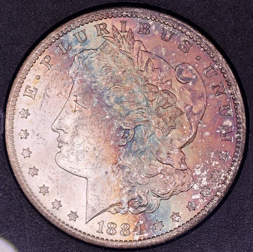 1884-CC Morgan Silver Dollar GSA Hoard NGC MS63 - Beautifully Rainbow Toned