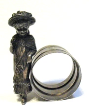 VINTAGE SILVER PLATE NAPKIN RING FEMALE CHILD FIGURAL