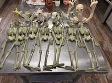 Assorted Halloween Decor And Skeletons Lot