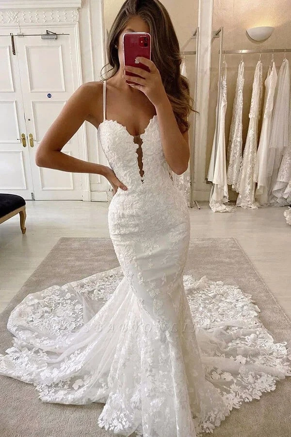 Deep v spaghetti strap wedding best sale dress