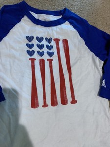 red white and blue baseball shirt