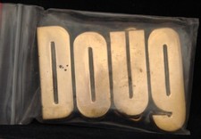 LF20114 NOS VINTAGE 1970s/80s CUT-OUT NAME  DOUG  SOLID BRASS BELT BUCKLE