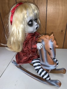girl on rocking horse halloween