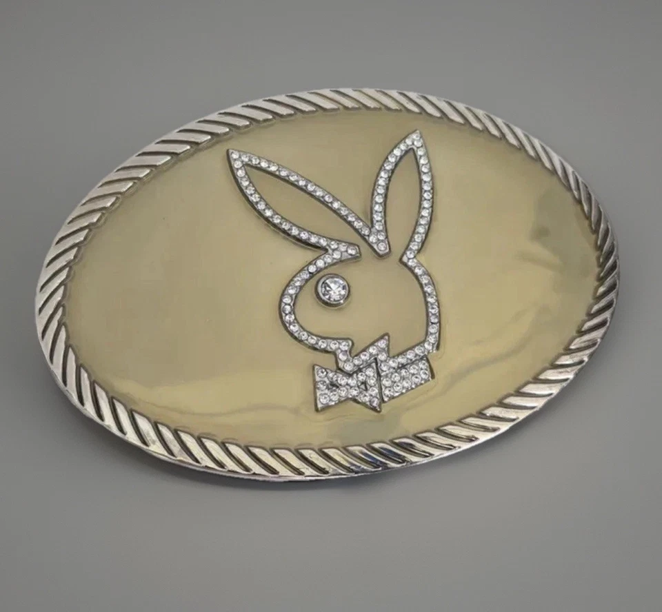 Hebilla de cinturón vintage Playboy Bunny estrás y resina esmaltada tono dorado y plateado. Foto 2 de 4