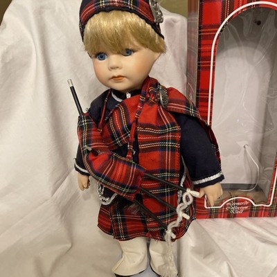 The Leonardo Porcelain Doll Collection Piper with box & stand