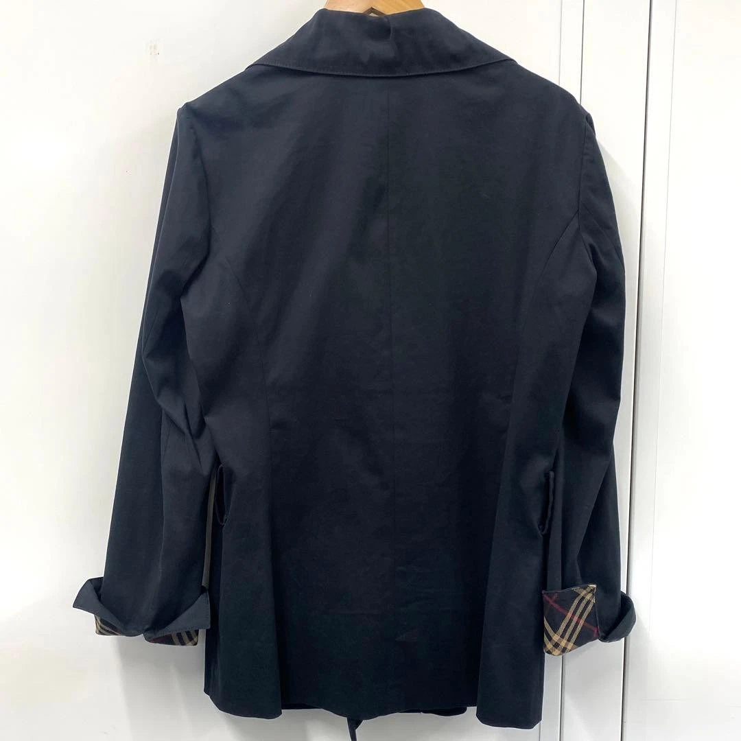 Chaqueta de trinchera BURBERRY BLUE LABEL negra puños a cuadros Nova elásticos JP 38 US S