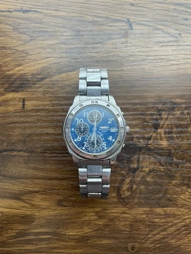 Vintage 1999 Seiko Chronograph V657-9010 Blue  Dial Quartz Mens Watch Japan READ