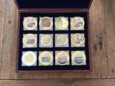 British Banknote Commemorative Coins x 12 in Case inc. 5 x &pound;50 note coins
