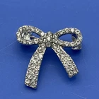 Vintage Rhinestone Bow Brooch Silver Tone Ribbon Pin 1” Costume Jewelry