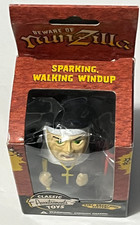 Accounttrements Classic Toys beware of Nun-Zilla Sparking Walking Windup Toy