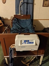 Hospital bed with twin size air mattress in good condition and new air pump