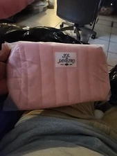 New Sol De Janeiro TSA-approved quilted travel pouch in pink