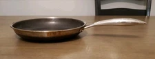 HexClad Hypbrid Nonstick Stainless Steel 10" Frying Pan With No Lid Has Wear