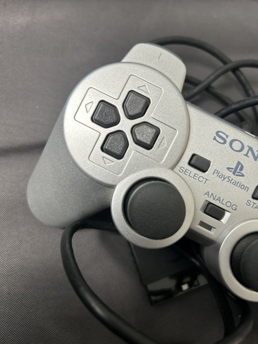 Manette PlayStation 2 (PS2) Officielle Sony DualShock - Modèle Argenté SCPH-10010 - Occasion Fonctionnelle