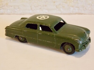 A Dinky Toys No. 170 Ford Fodor sedan, finished in blue and pink with blue hubs, boxed, with colour