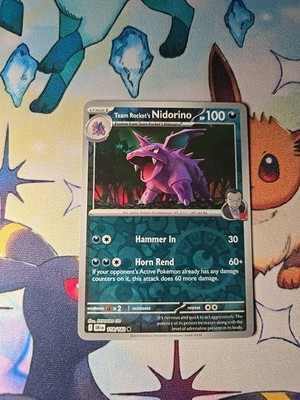 Team Rocket's Nidorino 118/182 Sv10: Destined Rivals Reverse Holo