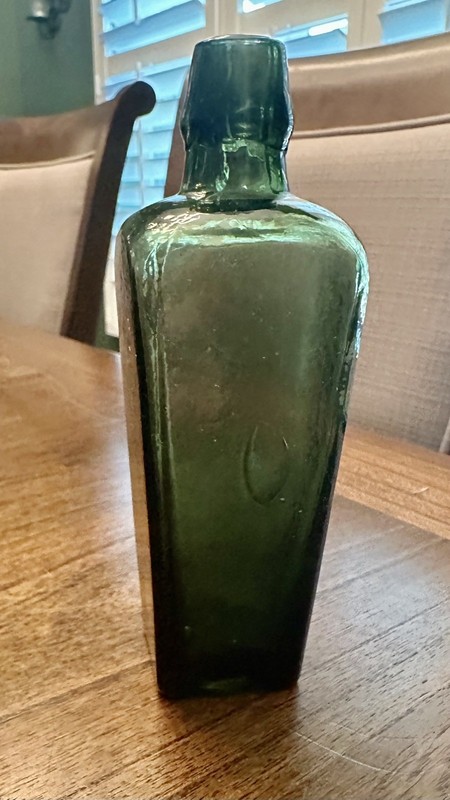 Vintage small hand blown olive green glass gin bottle