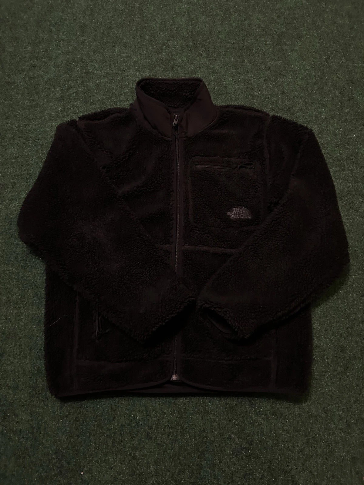 Black warm and fuzzy north face fleece jacket great condition