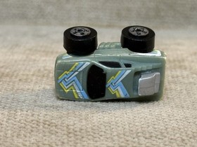 Micro Machines 1987 Quadchamps Green lifted car