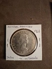 1963 CANADIAN SILVER DOLLAR Queen Elizabeth II COIN 80% Silver .60 troy oz ASW