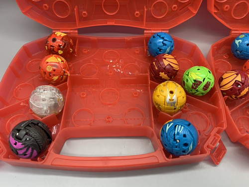 Lotto 19 palline BAKUGAN Evoluzioni, 2 custodie rosse, gettoni, carte guida istruzioni - Foto 4 di 8