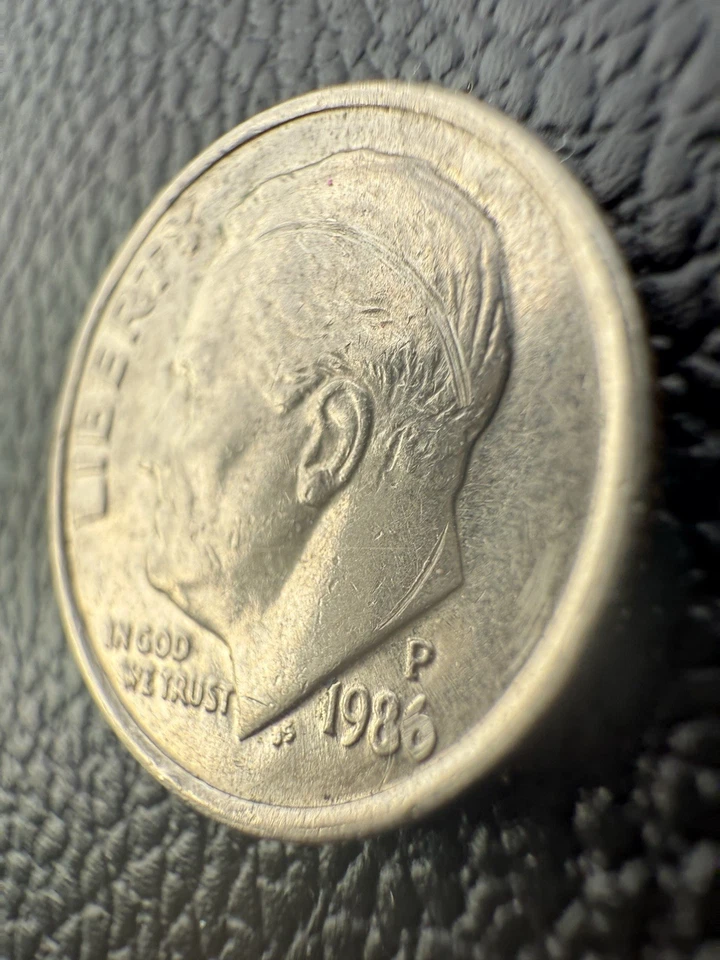 Moneda de diez centavos Roosevelt 1986 P-10C doble golpeada descentrada error de acuñación Foto 3 de 4
