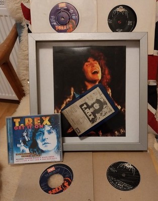 Marc Bolan & T.Rex, collection,Framed 8 track cassette, 4× 7'' singles+ 1 CD.