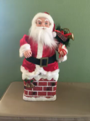 Animated Santa Sings Up On The House Top And Goes Up & Down Pan