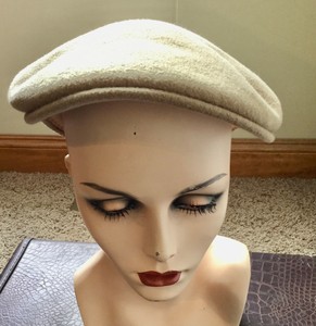 tan kangol hat
