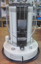 older Kero-Sun Omni 105 kerosene heater made in Japan 18,000 BTU w/ instructions