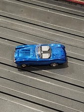 JOHNNY LIGHTNING BLUE COBRA ORIGINAL TJET CHASSIS