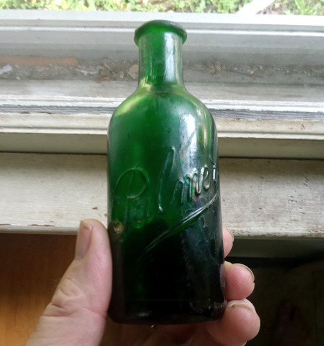 DARK GREEN PALMER COLOGNE BOTTLE SHOWN DUG IN ONE OF OUR VIDEOS